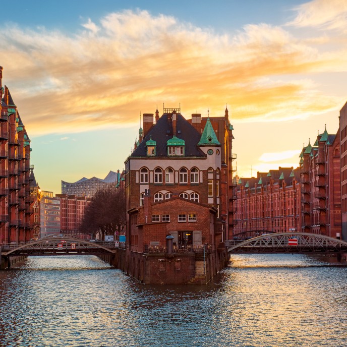 The Warehouse district Speicherstadt during sunset in Hamburg, Germany. Old warehouses in Hafencity quarter in Hamburg.